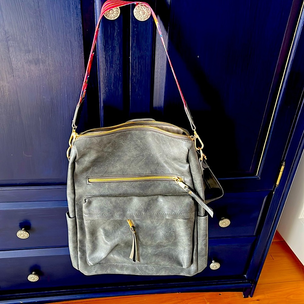 Brand New Gray Leather Modem Chic purse/backpack with shoulder strap.
